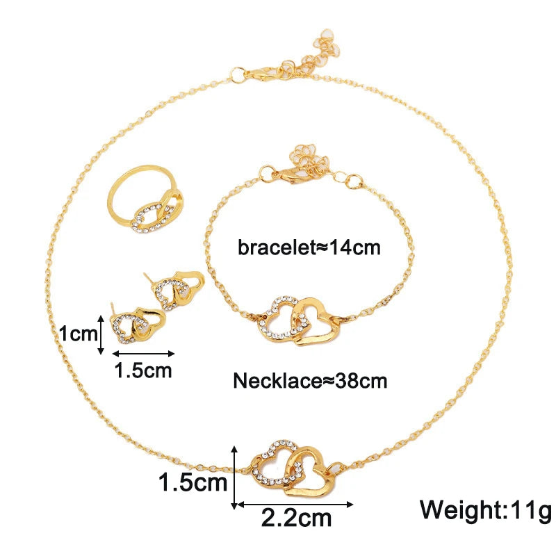 Parure de Bijoux Cœur Bohème – Boucles d'Oreilles, Collier, Bracelet & Bague Dorés